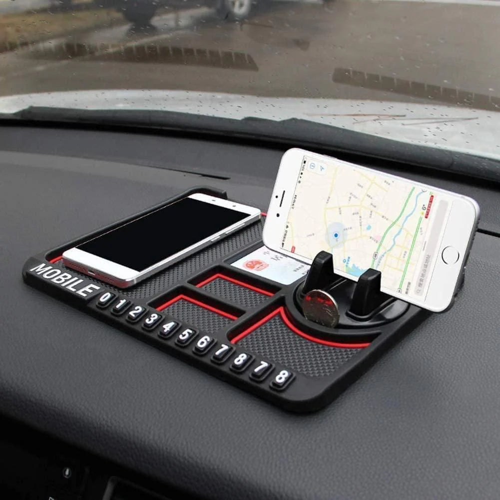 Car dashboard organizer with phone holders and number plates on a car's dashboard.