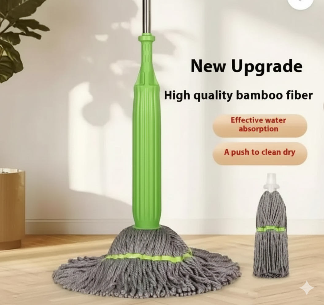 A green and grey mop standing upright on a wooden floor, with text overlays that read "New Upgrade," "High quality bamboo fiber," "Effective water absorption," and "A push to clean dry." A bundled replacement mop head is shown on the right.