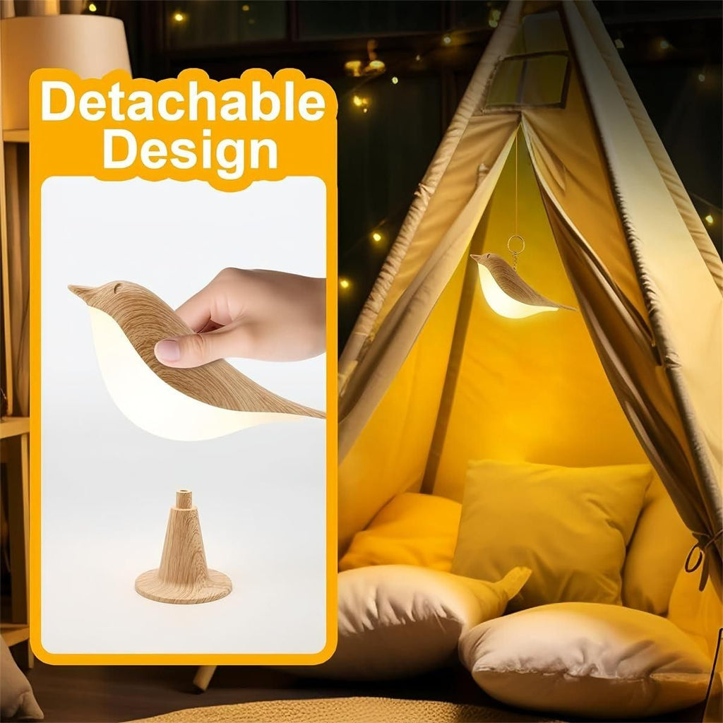 Image demonstrating the detachable design, showing the bird light being lifted off its base for use as a portable or hanging light (e.g., in a tent).